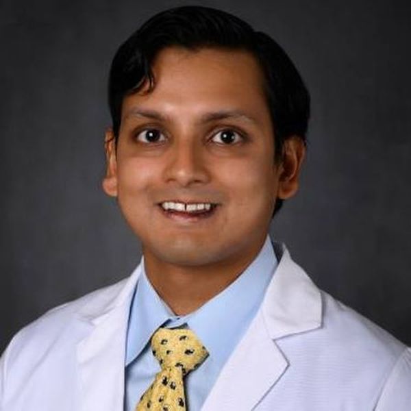 Dr. Dhar